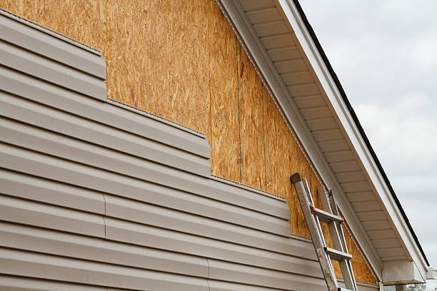 Professional Siding Installation technician working in Gaithersburg, MD
